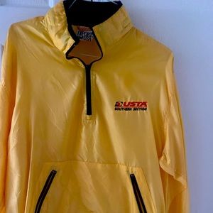 Nice nylon pullover. Zip with draw string bottom.